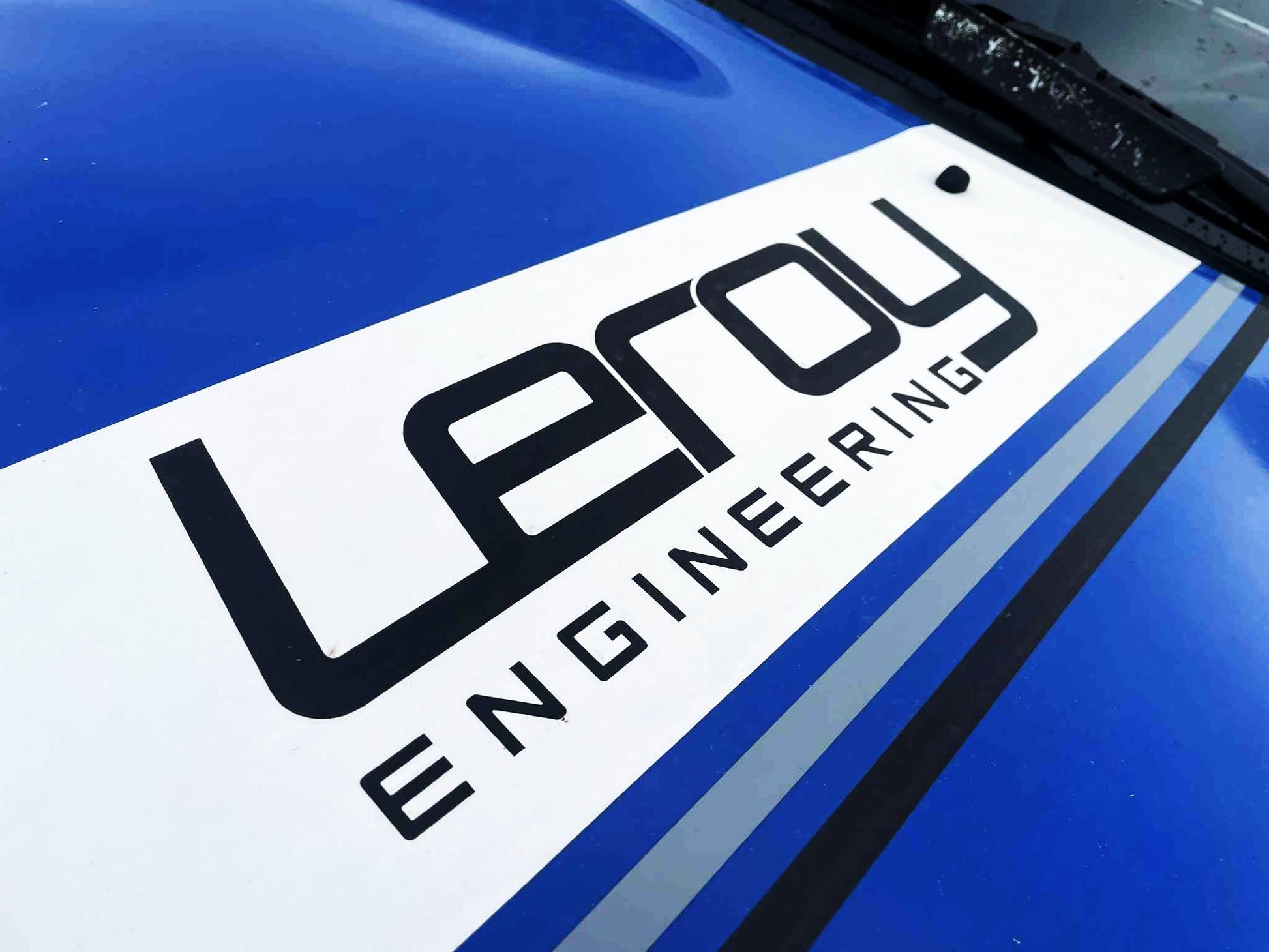 Leroy Engineering logo on a blue vehicle